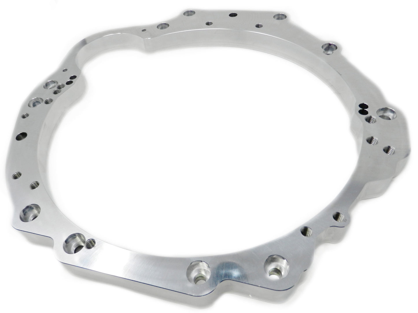 This is an Aluminum Adapter plate that joins the Ford, FPV F6 Typhoon, Tornado, FG/FG-X Falcon 4.0 Engine to the Nissan / Infiniti Series of 6-speed Manual Transmissions from the 350Z, 370Z, G35, G37, G60 vehicles. This adapter plate is Aluminum approximately 1.1" thick, and weighs approximately 3lbs.