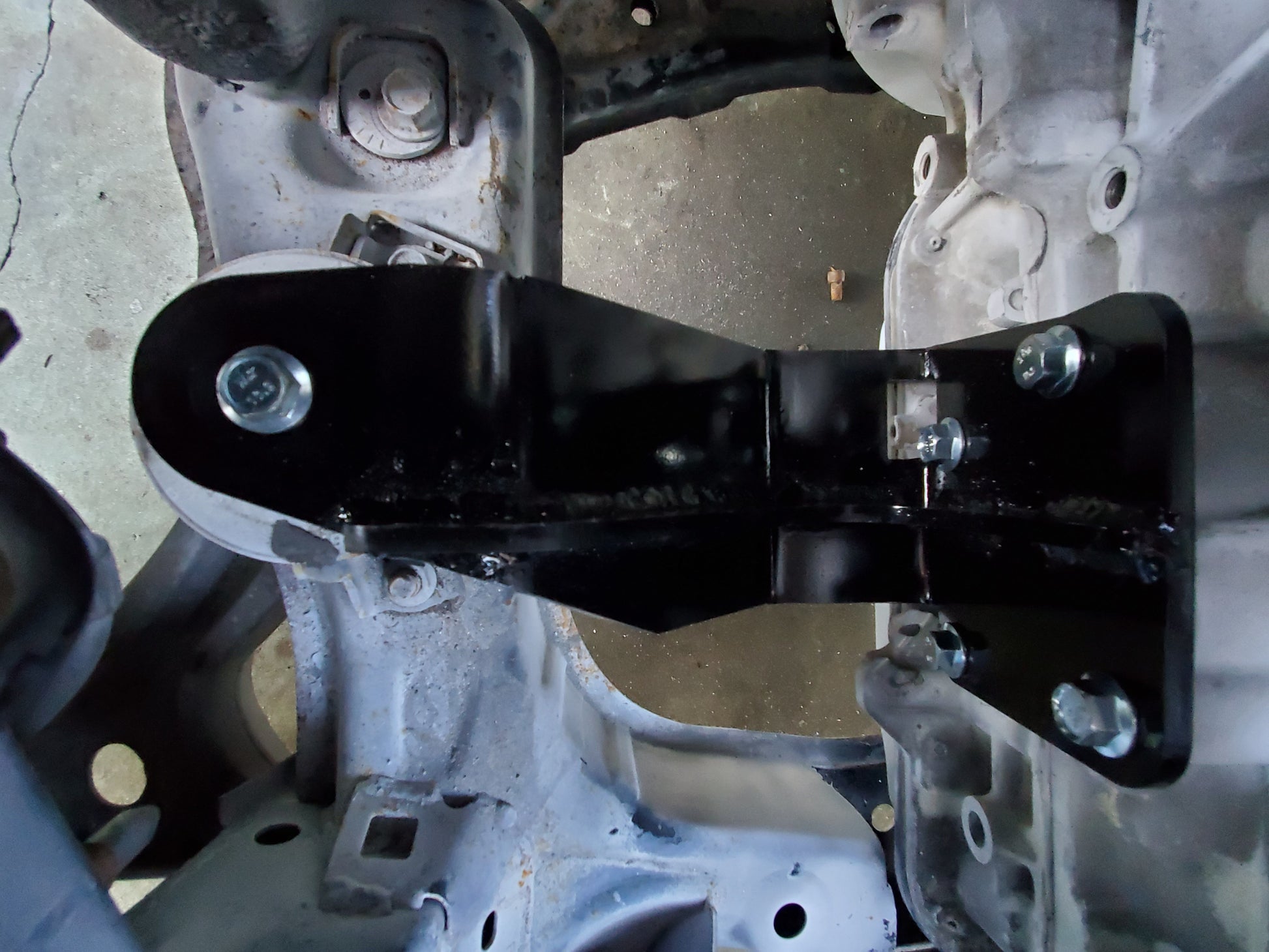 Steel powder coated engine mounts for the Honda K-Series to Mazda RX-8 installed in engine bay