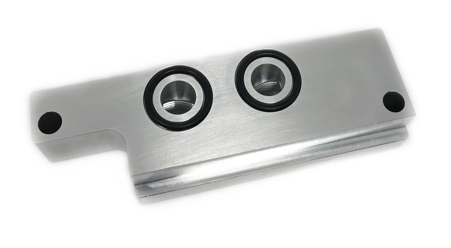 Oil pan remote oil filter adapter